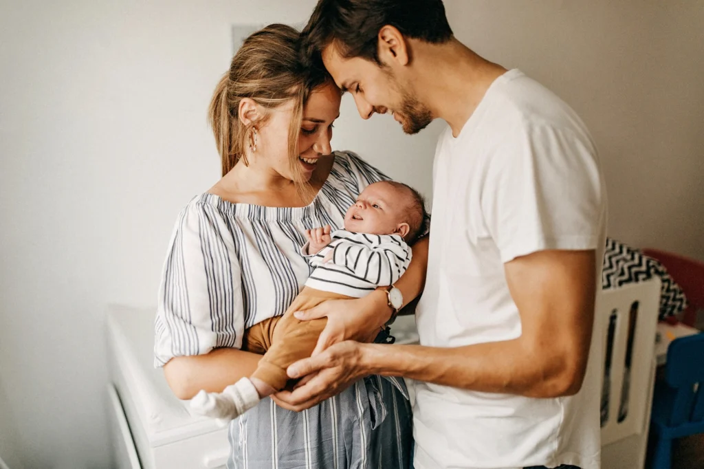 Parents holding their baby